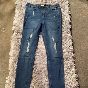 Women's Distressed Blue Jeans